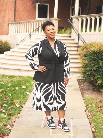 Brandy Wimberly standing outside a red-brick building